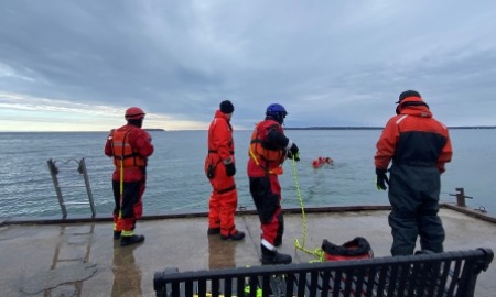 Group of firefighters practicing water rescue on Lake Simcoe