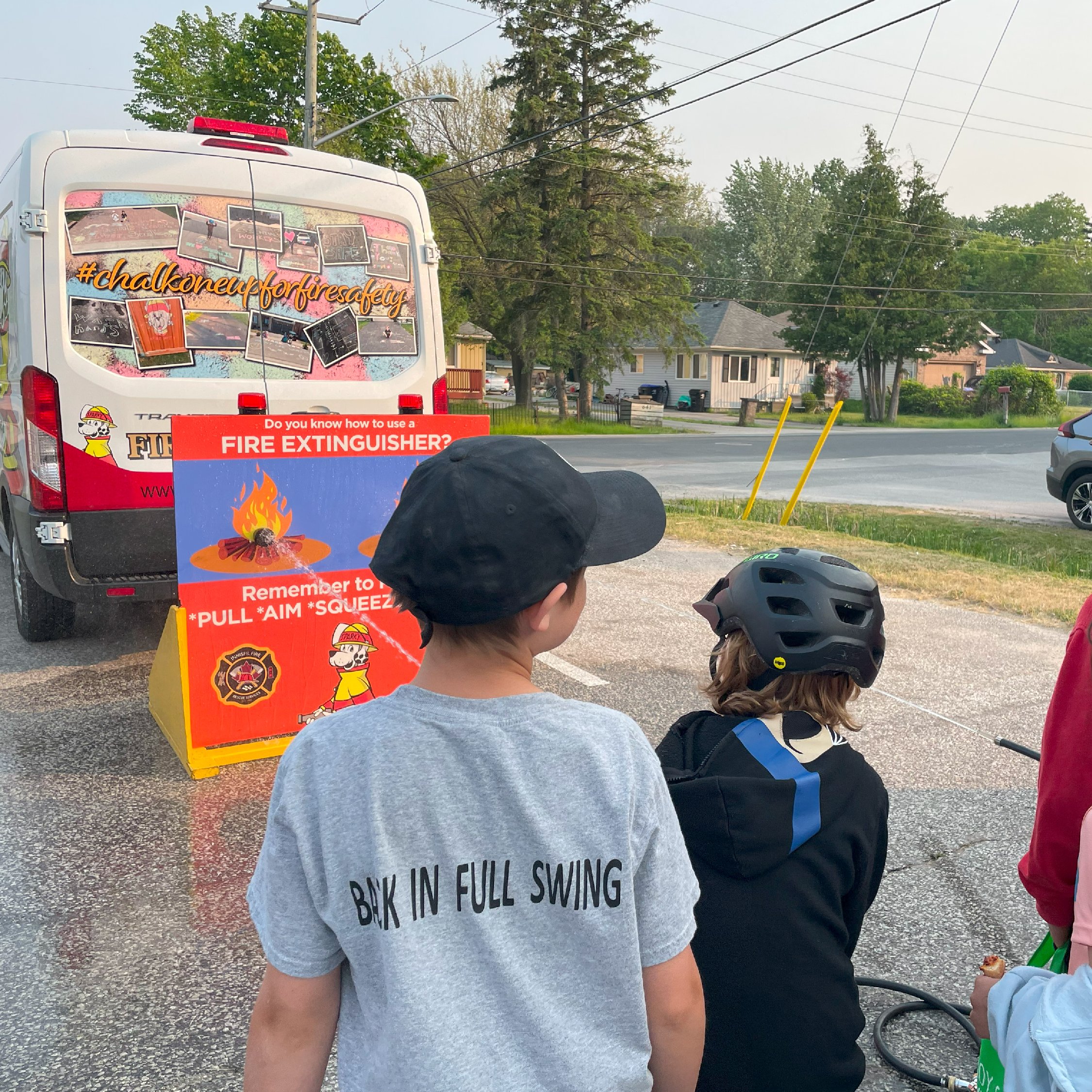 Kids putting out demonstration fire