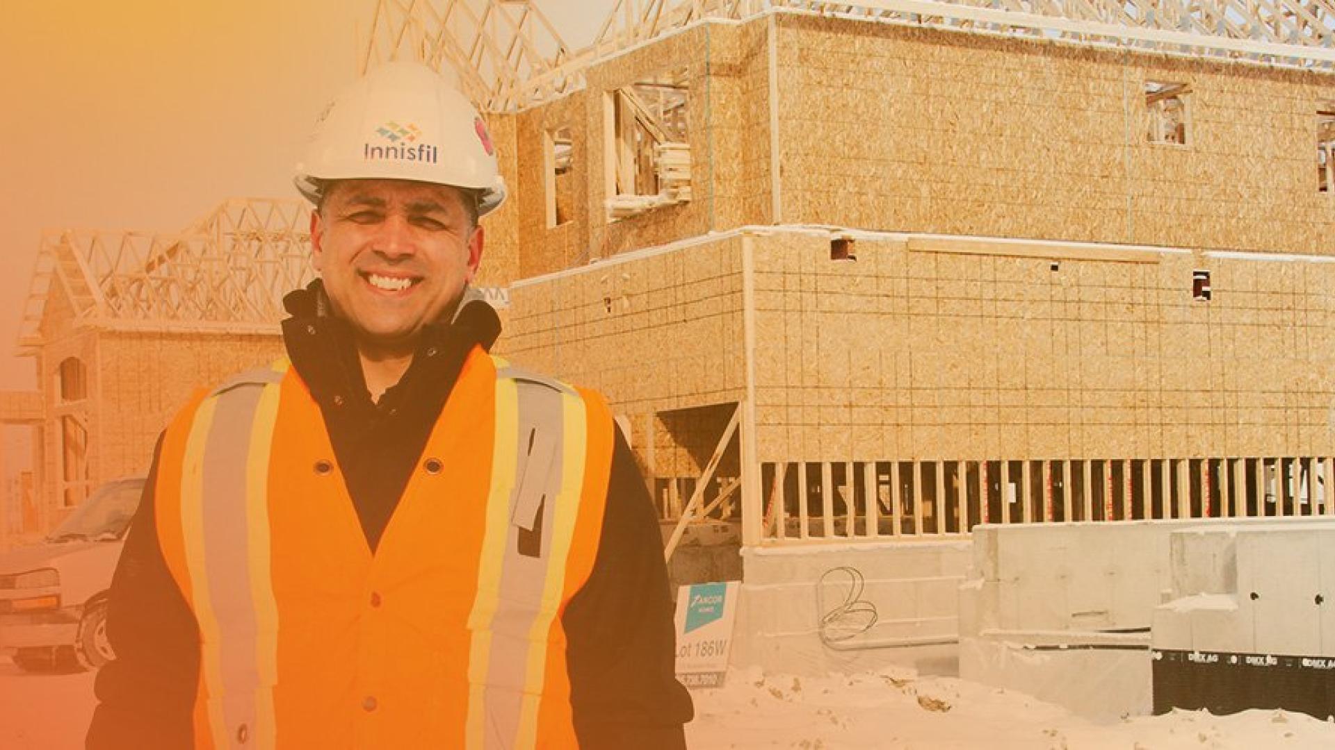 building inspector smiling outside after completing residential inspection