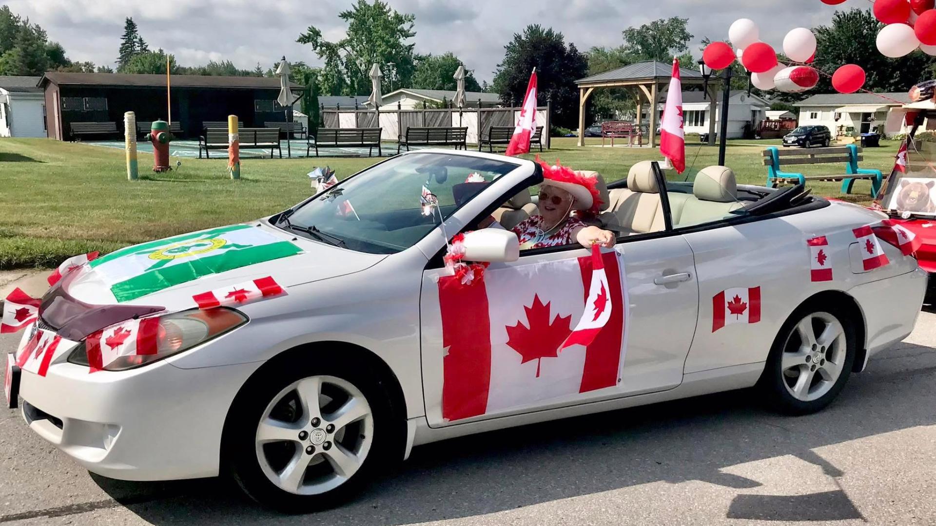 Vehicle decorated for Canada Day in parade