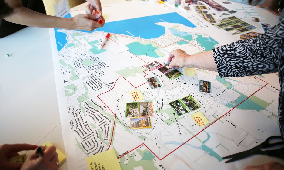 People working on draft plan at engagement event