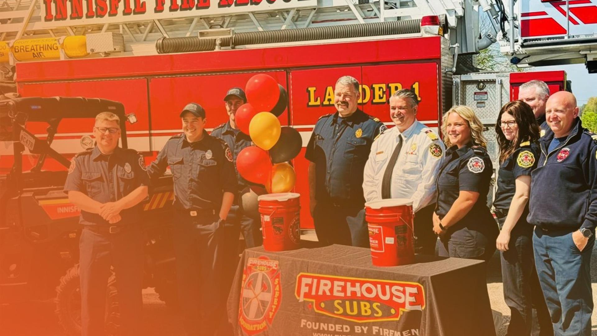 IFRS team members in front of fire truck