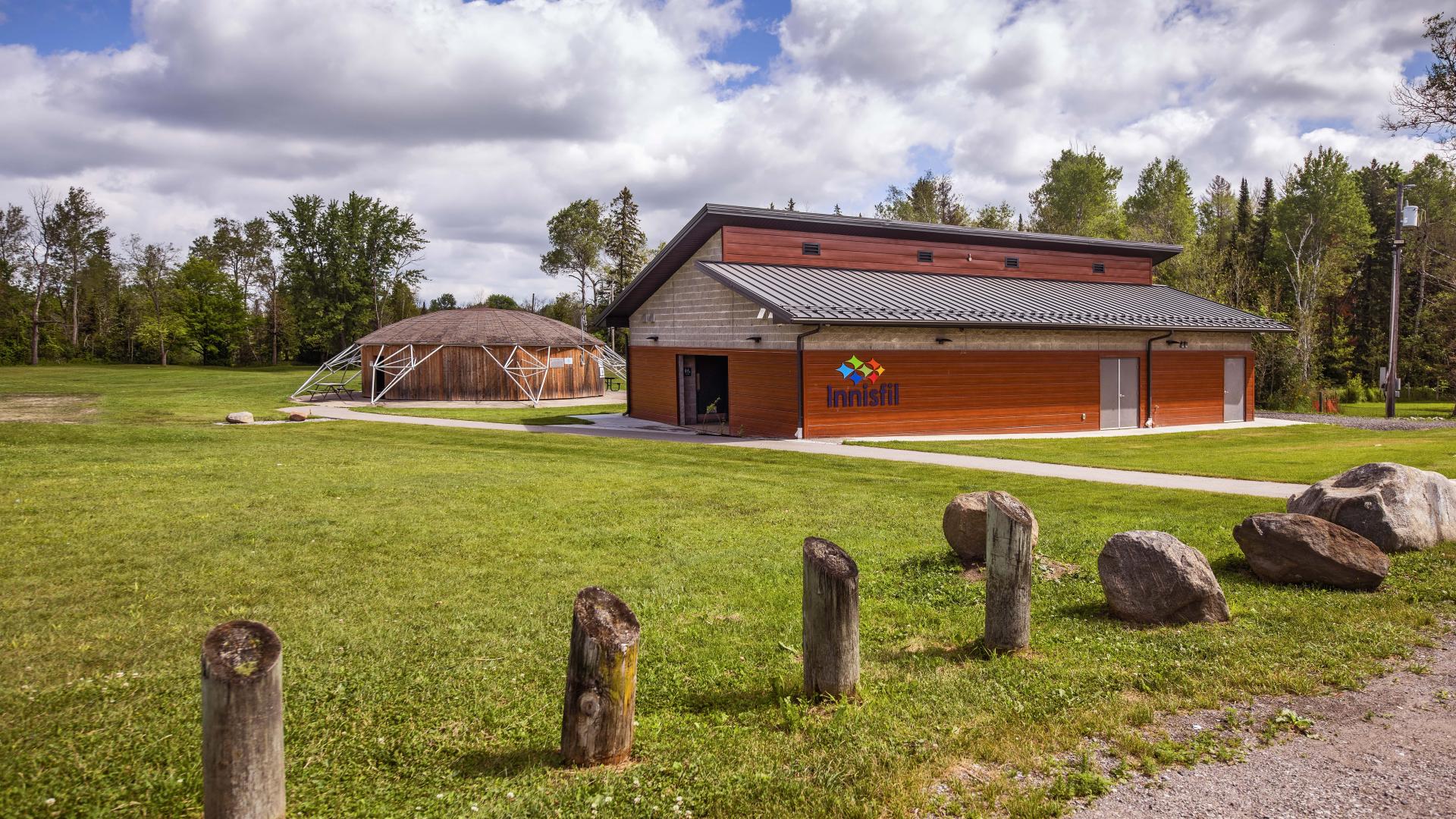 A round gazebo next to a building structure