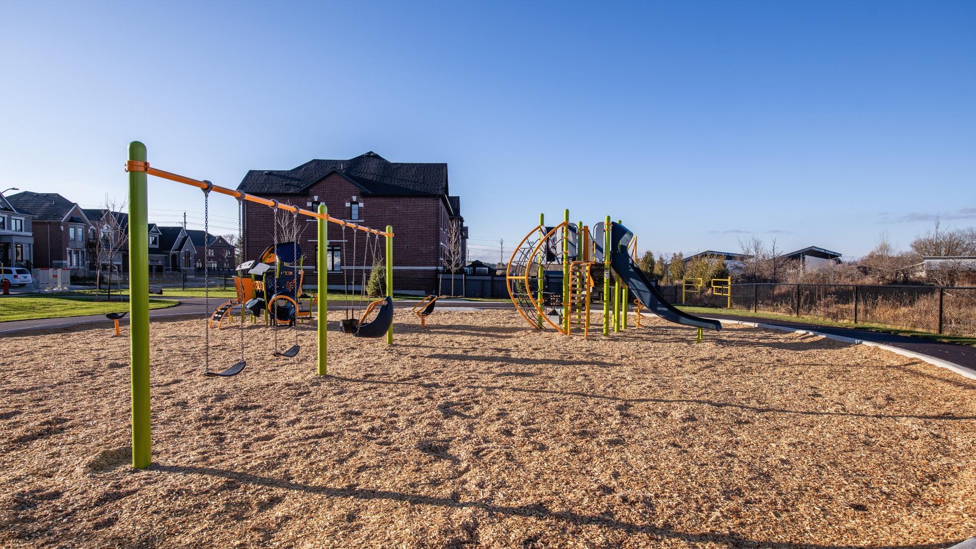 New playground equipment and swings with trail connections