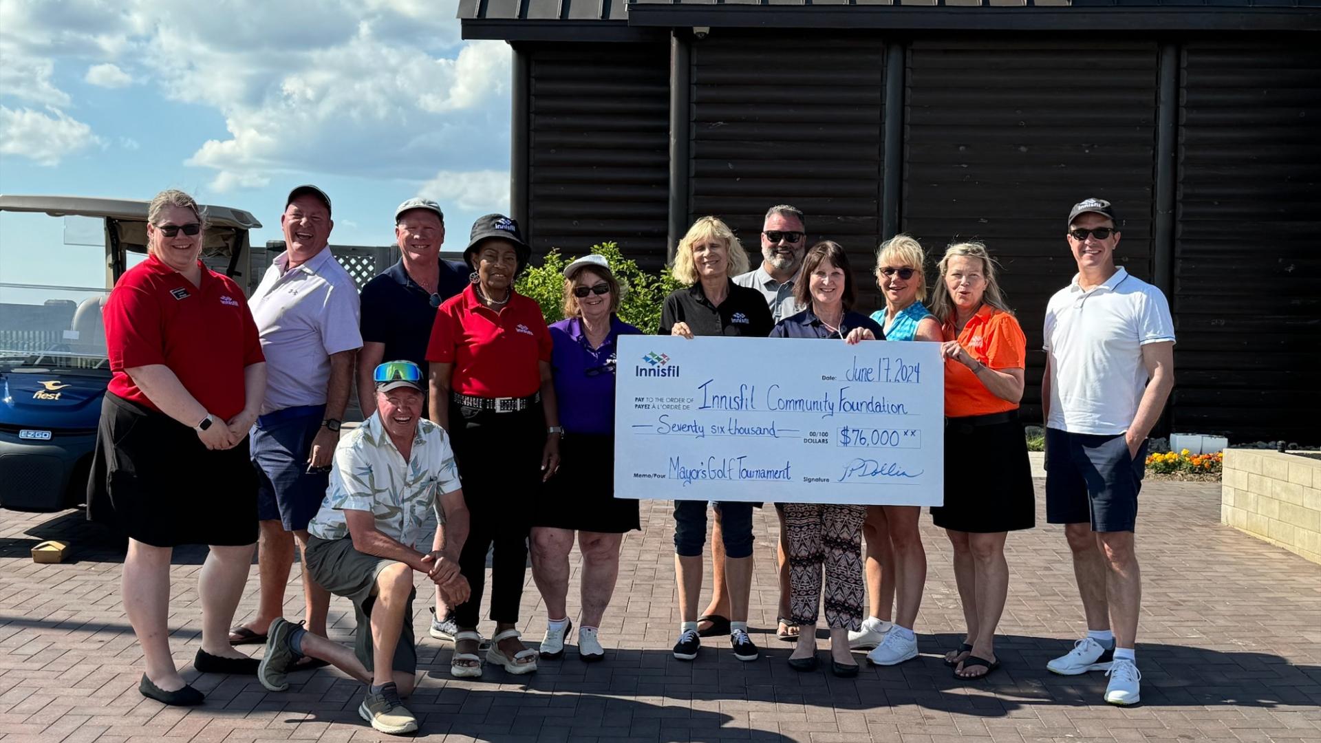 Innisfil Council presenting a check to Innisfil Community Foundation representatives at the Mayor's Golf Tournament