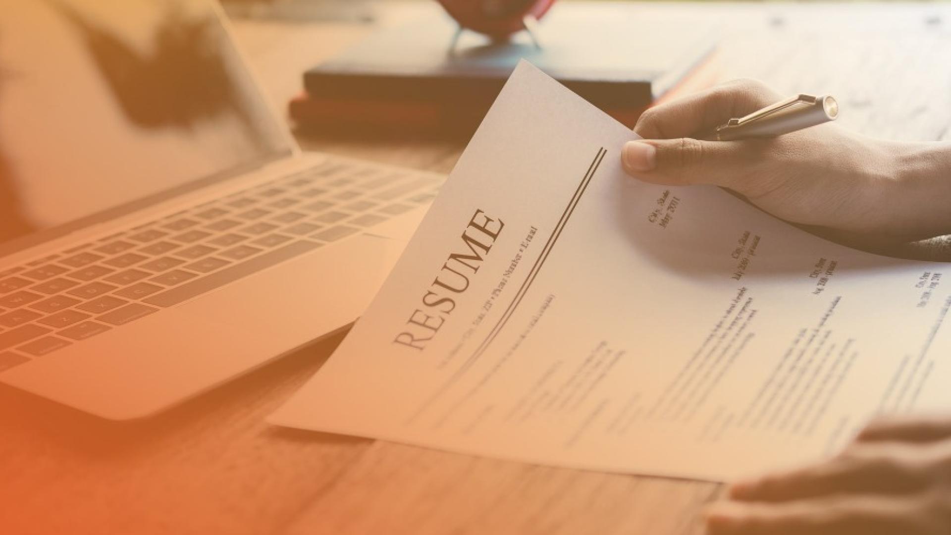 Man looking at resume 