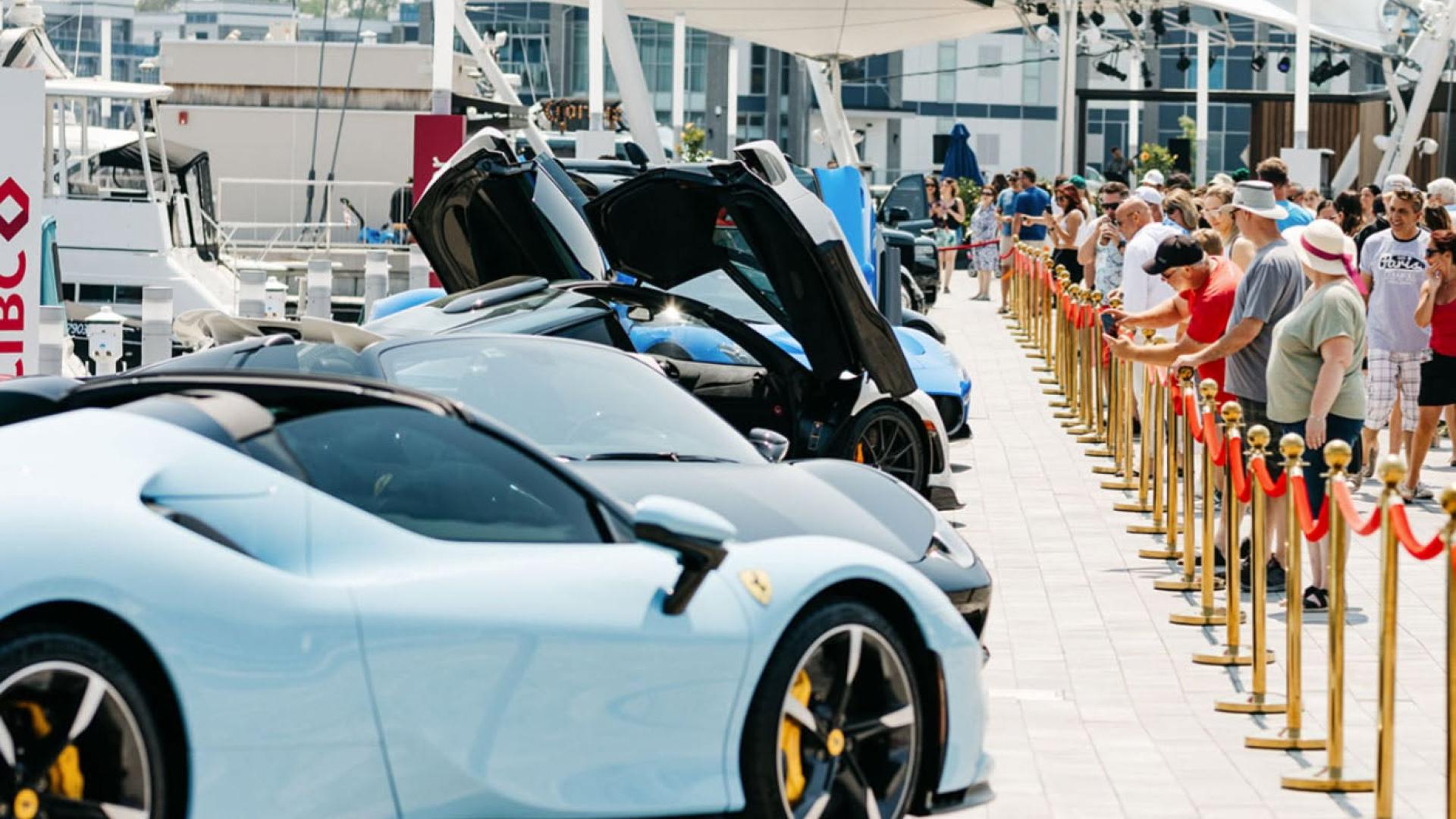 Luxury car lineup along Promenade at Friday Harbour Resort