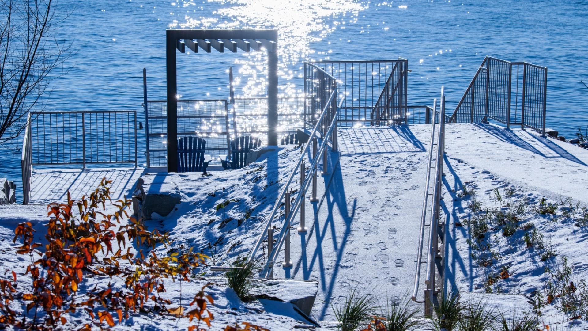 Paved access with steps to the water during the winter