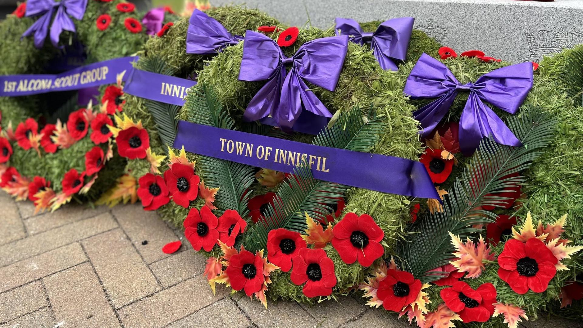 Wreaths with poppies laid out for Remembrance Day
