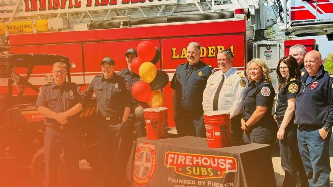 IFRS team members in front of fire truck