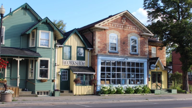 Street view of three heritage properties side-by-side