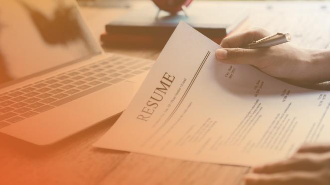 Man looking at resume 