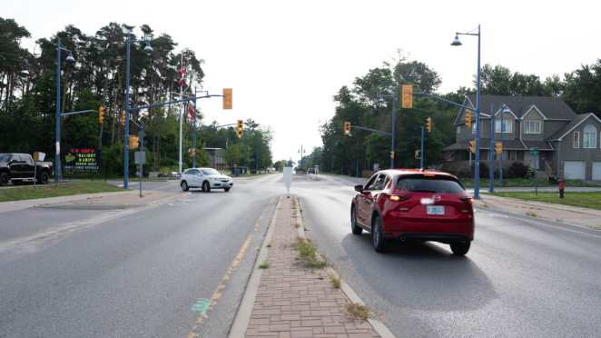 Cars driving near intersection in Innisfil