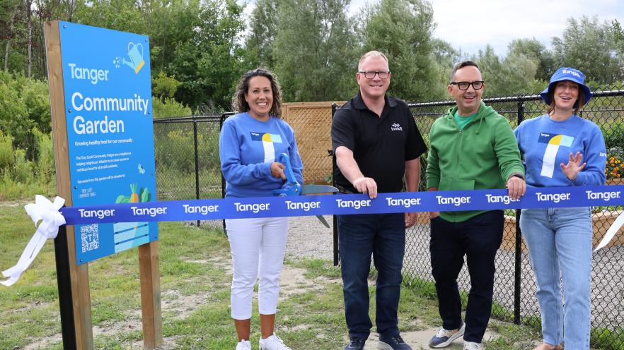 Ribbon cutting at Tanger's Community Garden