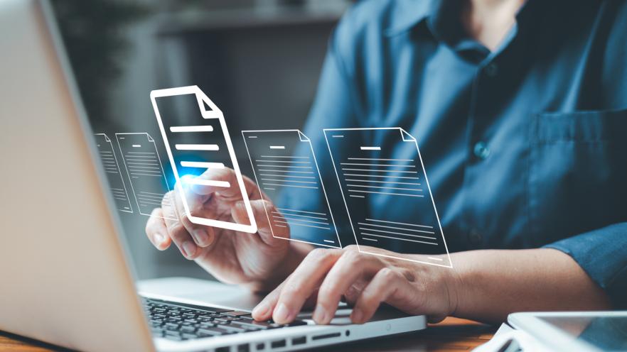 Person searching documents on a computer