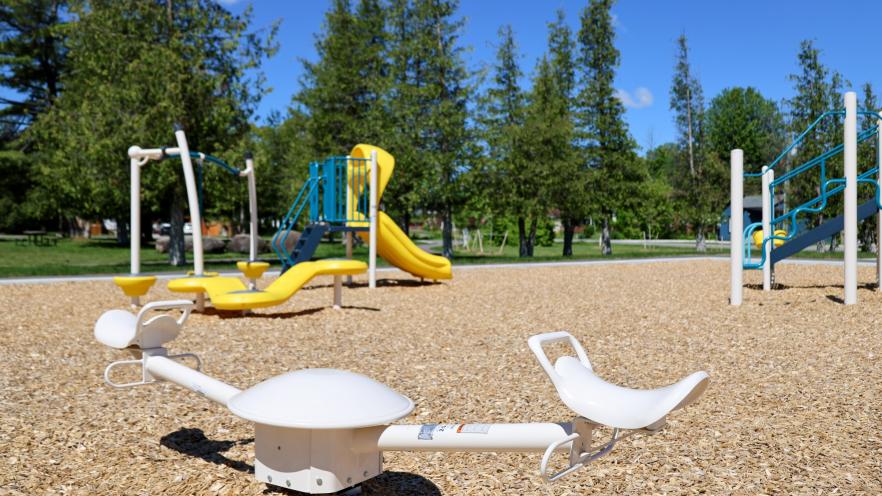 New playground equipment at Nantyr Park with swings, slides, and climbing features