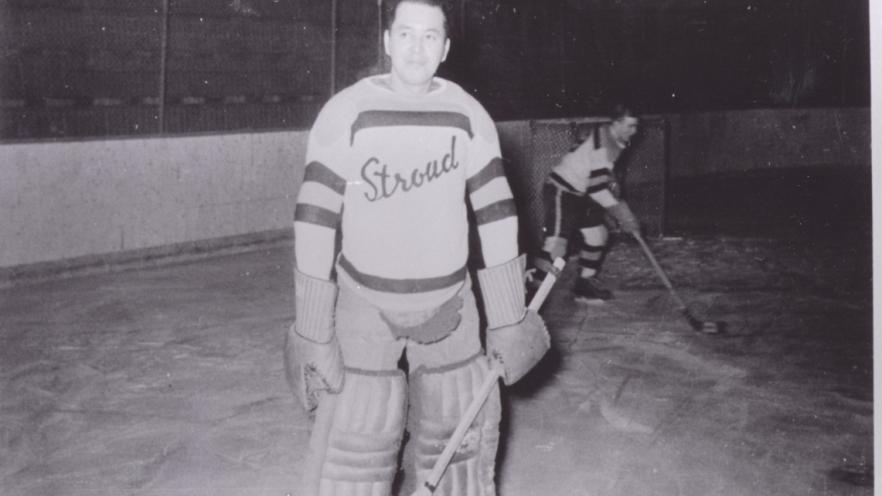 Goalie Johnny Snache is aged black and white photo from 1950