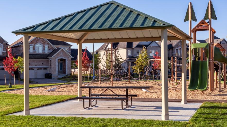 Outdoor shade structure at park with picnic bench