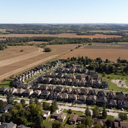 Aerial view of farmland and housing development