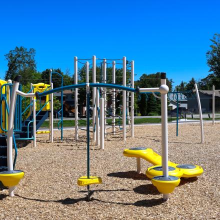 New playground equipment at Nantyr Park with swings, slides, and climbing features